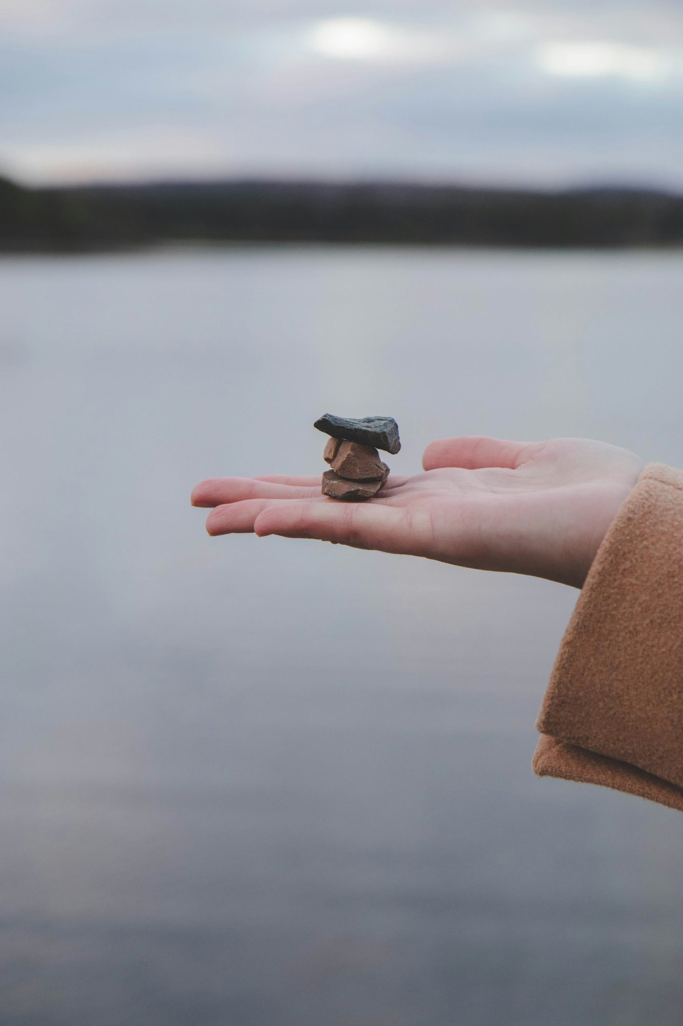 woman holding foundation stones